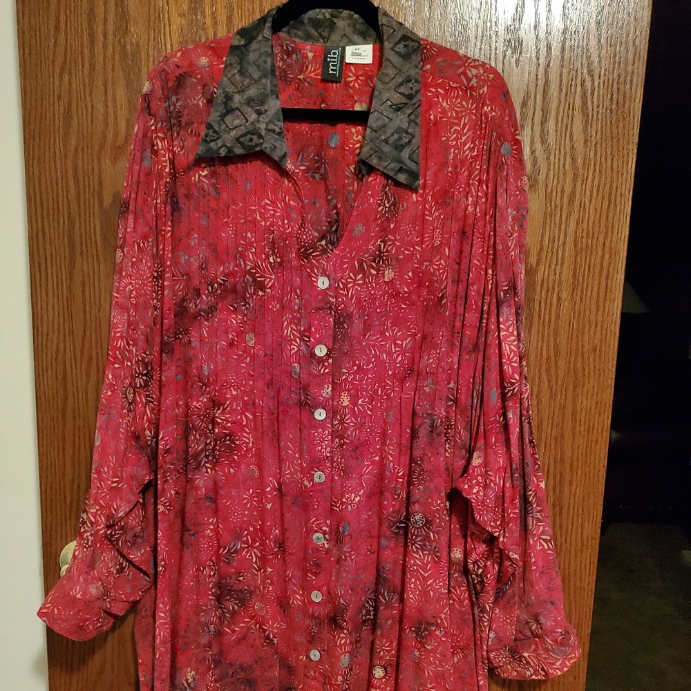 Pretty red blouse with leaves and flowers